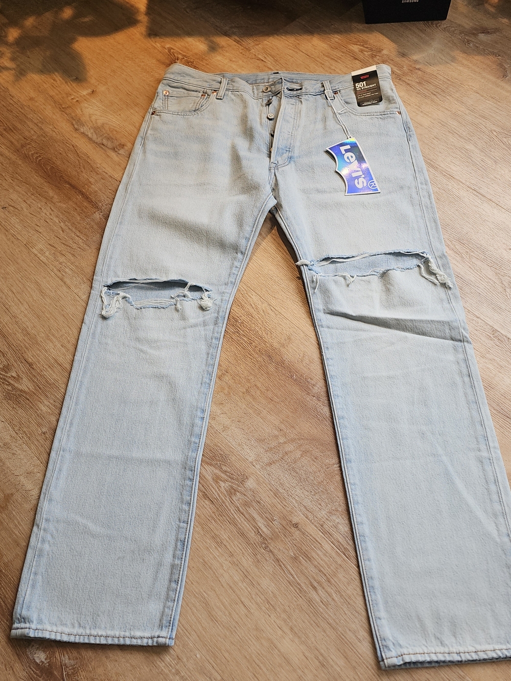 Levi's Light Blue Straight Men's Jeans with Knee Rips